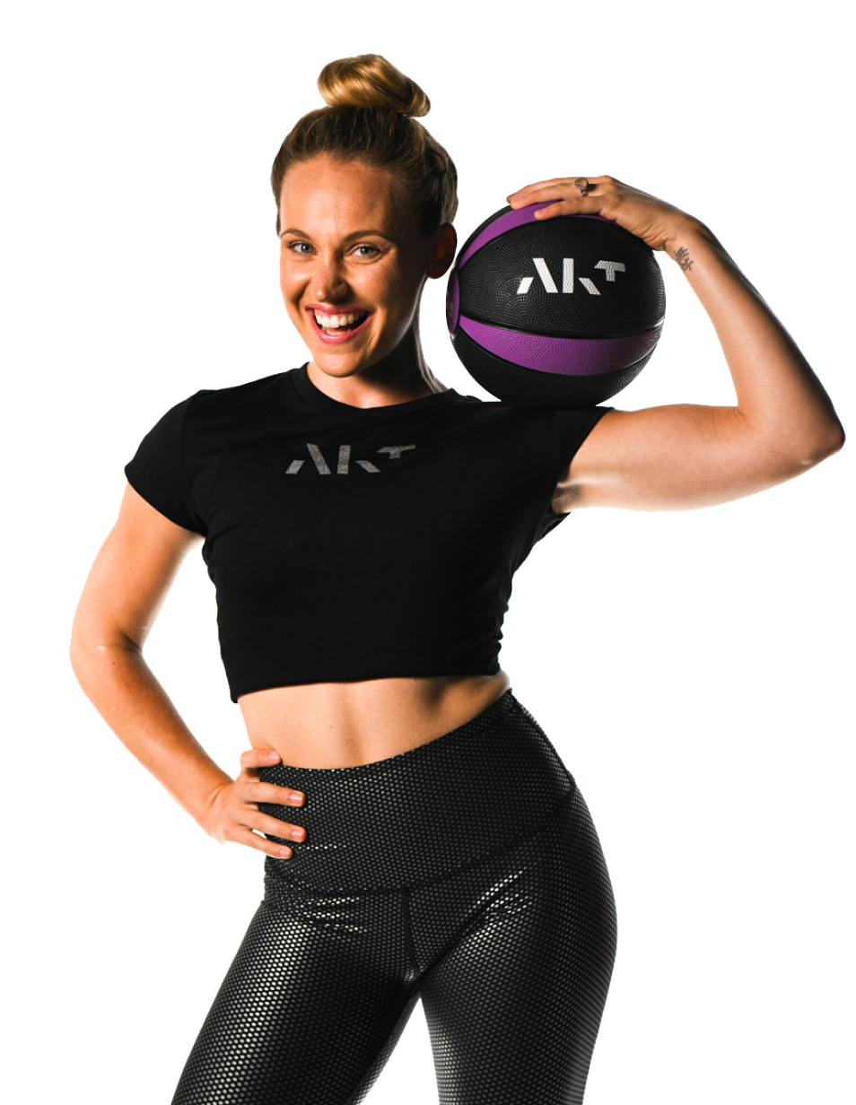 Woman posing with AKT ball
